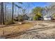 Single-story home with attached garage and a gravel driveway at 785 Seabolt Rd, Locust Grove, GA 30248