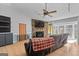 Living room with stone fireplace and access to sunroom at 785 Seabolt Rd, Locust Grove, GA 30248