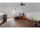 Simple bedroom with hardwood floors and ceiling fan at 785 Seabolt Rd, Locust Grove, GA 30248