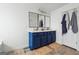 Modern bathroom with a double vanity and stylish blue cabinets at 5602 Waverly Park, Atlanta, GA 30349