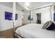 Serene bedroom with a canopy bed and a wall-mounted TV at 5602 Waverly Park, Atlanta, GA 30349