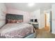 Spacious bedroom with a queen bed and access to another room at 5602 Waverly Park, Atlanta, GA 30349