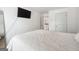 Bedroom with queen bed and mounted TV at 5602 Waverly Park, Atlanta, GA 30349