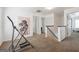 Upstairs hallway with carpet and access to bedrooms at 5602 Waverly Park, Atlanta, GA 30349