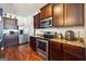 Kitchen with stainless steel appliances and wood cabinets at 5602 Waverly Park, Atlanta, GA 30349