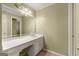 Bright bathroom with vanity, large mirror, and classic lighting at 7300 Chattahoochee Bluff Dr, Sandy Springs, GA 30350