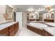 Elegant bathroom featuring a large soaking tub, double vanities, and lots of storage at 7300 Chattahoochee Bluff Dr, Sandy Springs, GA 30350
