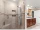 Contemporary shower with tile surround and dual shower heads, complemented by a vanity at 7300 Chattahoochee Bluff Dr, Sandy Springs, GA 30350