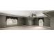 Spacious gray bedroom featuring two windows, crown molding, and a ceiling fan at 7300 Chattahoochee Bluff Dr, Sandy Springs, GA 30350