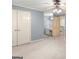 Bedroom with ensuite vanity area, closet and carpet at 7300 Chattahoochee Bluff Dr, Sandy Springs, GA 30350