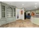 Spacious kitchen with custom cabinets and eat in area with a view to the backyard at 7300 Chattahoochee Bluff Dr, Sandy Springs, GA 30350