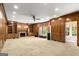 Expansive living room showcasing a fireplace, built-in shelving, and natural light at 7300 Chattahoochee Bluff Dr, Sandy Springs, GA 30350