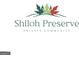 Logo for the private community of Shiloh Preserve with decorative leaves at 4333 Shiloh Rd, Cumming, GA 30040