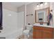Bathroom featuring a bathtub, a toilet, and a wooden vanity with mirror at 1115 Oakpark Drive Dr, Mcdonough, GA 30253