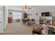 Spacious carpeted bonus room including a desk, seating, and shelves at 1115 Oakpark Drive Dr, Mcdonough, GA 30253