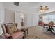 Spacious carpeted bonus room including a desk, seating, and shelving units at 1115 Oakpark Drive Dr, Mcdonough, GA 30253
