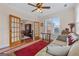 Cozy living room featuring wood floors, neutral paint, and ample natural light at 1115 Oakpark Drive Dr, Mcdonough, GA 30253