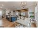 Kitchen and dining area with farmhouse table and chandelier at 2803 Mathews Se St, Smyrna, GA 30080