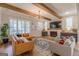 Elegant living room with hardwood floors and a cozy fireplace at 2803 Mathews Se St, Smyrna, GA 30080