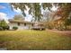 Spacious backyard featuring a deck and lush green lawn perfect for outdoor activities at 105 Tranquility Dr, Villa Rica, GA 30180