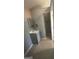 Bathroom features a white single sink vanity with gray cabinets and a mirror mounted above the sink at 105 Tranquility Dr, Villa Rica, GA 30180