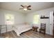 Well-lit bedroom featuring neutral colored walls and ample natural light at 105 Tranquility Dr, Villa Rica, GA 30180