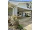 Covered carport with brick detailing, offering convenient access to the home's side entrance at 105 Tranquility Dr, Villa Rica, GA 30180