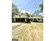 Charming one-story home with a covered carport and lush lawn, perfect for suburban living at 105 Tranquility Dr, Villa Rica, GA 30180