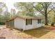 Exterior view of house and detached garages or storage at 105 Tranquility Dr, Villa Rica, GA 30180