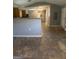 Open concept kitchen with gray walls and brown flooring at 105 Tranquility Dr, Villa Rica, GA 30180