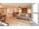 Open concept living room featuring fireplace and open view of kitchen at 105 Tranquility Dr, Villa Rica, GA 30180
