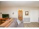 Cozy living room featuring modern laminate floors and neutral paint at 105 Tranquility Dr, Villa Rica, GA 30180