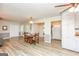Spacious living room with laminate floors, neutral walls, and natural light at 105 Tranquility Dr, Villa Rica, GA 30180