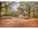 Multiple outbuildings providing ample storage space and functionality on the property at 105 Tranquility Dr, Villa Rica, GA 30180