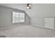 Bedroom with neutral gray walls, carpet, ceiling fan, and window at 684 Brooks Woolsey Rd, Brooks, GA 30205
