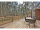 Large wooden deck overlooking backyard and trees at 684 Brooks Woolsey Rd, Brooks, GA 30205