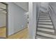Hallway featuring new gray paint and wood laminate flooring at 684 Brooks Woolsey Rd, Brooks, GA 30205