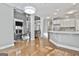 Spacious open floor plan with a fireplace, kitchen, dining and living areas perfect for entertaining guests at 684 Brooks Woolsey Rd, Brooks, GA 30205