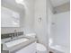 Clean bathroom featuring a modern vanity, a frameless mirror, and a walk-in shower with white tiled walls at 4239 Newcomb Rd, Decatur, GA 30034