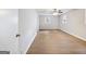 Spacious bedroom featuring hardwood floor, a ceiling fan, and large windows at 4239 Newcomb Rd, Decatur, GA 30034