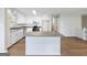 Bright, updated kitchen boasts stainless steel appliances, a center island, and ample storage space at 4239 Newcomb Rd, Decatur, GA 30034
