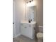 Well-lit bathroom featuring modern vanity with sink and toilet at 152 Wet Wood Dr # 10, Fairburn, GA 30213