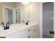 Bathroom featuring a double sink vanity with modern faucets and a view into the shower/tub combo at 152 Wet Wood Dr # 10, Fairburn, GA 30213