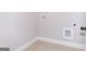 Laundry room featuring tile floors and utility connections, designed for efficiency and convenience at 152 Wet Wood Dr # 10, Fairburn, GA 30213