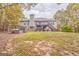 Backyard with a tiered deck, above-ground hot tub, and backyard with an open yard at 408 Gray Fox Dr, Canton, GA 30114