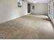 Spacious basement featuring white brick, neutral carpet and good natural light at 828 Pinevalley Dr, Forest Park, GA 30297