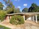 Brick single Gathering home featuring a well-maintained lawn and driveway at 828 Pinevalley Dr, Forest Park, GA 30297
