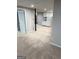 Finished basement area with kitchenette, white appliances, and access to laundry hookups at 7193 Tara Dr, Villa Rica, GA 30180