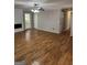 A spacious living room with hardwood floors and modern fireplace at 7193 Tara Dr, Villa Rica, GA 30180