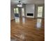 A spacious living room with hardwood floors and a modern fireplace at 7193 Tara Dr, Villa Rica, GA 30180